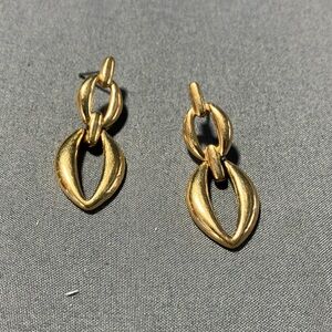 A beautiful pair of gold tone earrings
